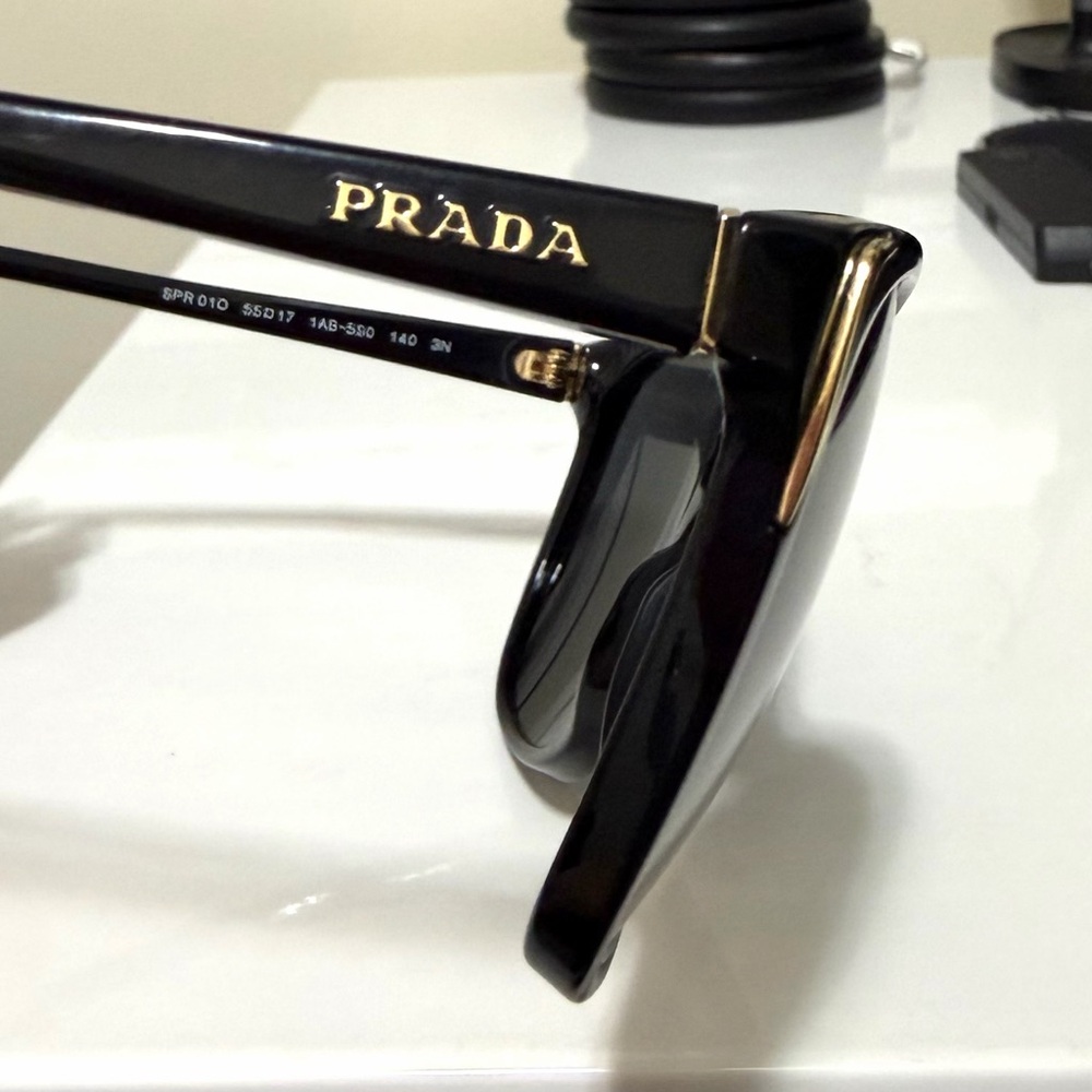 PRADA Women’s Sunglasses Black with Gold Detail
